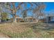 Charming bungalow style home with a spacious front yard at 3348 S Corona St, Englewood, CO 80113