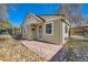 Updated bungalow home with a stone patio at 3348 S Corona St, Englewood, CO 80113