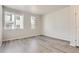 Bright bedroom with neutral walls and light grey flooring at 14083 Deertrack Ln, Parker, CO 80134