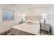 Bright bedroom with a queen-size bed, and two bedside tables at 12432 Meadowlark Ln, Broomfield, CO 80021