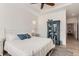 Main bedroom with white metal bed frame and blue accents at 12432 Meadowlark Ln, Broomfield, CO 80021