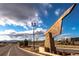 Community entrance with stone signage and landscaping at 12432 Meadowlark Ln, Broomfield, CO 80021