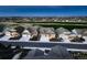 Stunning aerial view of a neighborhood showcasing beautiful homes, green spaces, and well-maintained streets at 15788 Valentia St, Thornton, CO 80602