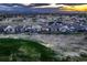 Expansive neighborhood view featuring tidy lawns and well-spaced homes under a picturesque sky at 15788 Valentia St, Thornton, CO 80602
