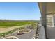Landscaped backyard features a patio, a flower bed, a lawn area and views of the neighborhood at 15788 Valentia St, Thornton, CO 80602