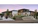 Beautiful exterior elevation of the home with landscaping and modern design elements at 6915 Tremolite Dr, Castle Rock, CO 80108