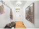 Bright entryway with hardwood floors and storage at 1947 King St, Denver, CO 80204