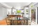 Bright kitchen and dining area features modern decor and an abundance of natural light at 1947 King St, Denver, CO 80204