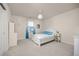 Bright bedroom with a decorative spherical light fixture and coordinating white furniture set at 806 Cabot Dr, Erie, CO 80516