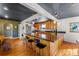 Bright and open kitchen featuring a large island and stainless steel appliances at 5601 E Colorado Ave, Denver, CO 80224