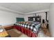 Basement bedroom with bed and side tables at 4825 S Ammons St # 113, Littleton, CO 80123