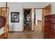Bedroom featuring open closet and an open doorway, providing depth and openness at 4825 S Ammons St # 113, Littleton, CO 80123