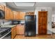 Efficient kitchen with appliances, granite counters and lighting at 4825 S Ammons St # 113, Littleton, CO 80123