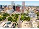 Panoramic aerial shot of city skyline, highlighting parks, buildings and landmarks at 1100 N Logan St # 9, Denver, CO 80203