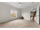 Bright bedroom with a large window offering natural light and featuring carpet floors for added comfort at 1100 N Logan St # 9, Denver, CO 80203