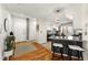 Open-concept kitchen with granite countertops, stainless steel appliances, and a breakfast bar with seating at 1100 N Logan St # 9, Denver, CO 80203