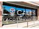 Modern storefront with sugar skull and Cale's Taco + Tequila Bar signage at 1100 N Logan St # 9, Denver, CO 80203