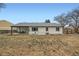 Rear view of home featuring a patio and backyard, showcasing outdoor living spaces at 17148 E Evans Dr, Aurora, CO 80013