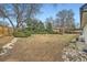Large backyard area, with some shrubs and trees, offering ample space for recreation at 17148 E Evans Dr, Aurora, CO 80013