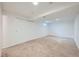 Unfurnished basement featuring neutral carpet and a closet at 17148 E Evans Dr, Aurora, CO 80013