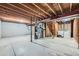 Unfinished basement with exposed ceiling and utilities, ready for customization and storage at 17148 E Evans Dr, Aurora, CO 80013