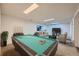 Basement with a pool table, seating area, and television at 17148 E Evans Dr, Aurora, CO 80013