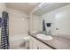 Bathroom featuring a bathtub, toilet, vanity, and a large mirror at 17148 E Evans Dr, Aurora, CO 80013