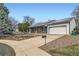 Charming home with a two-car garage, solar panels, and well-maintained landscaping at 17148 E Evans Dr, Aurora, CO 80013