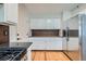 Kitchen boasts stainless steel appliances, ample cabinetry, and a functional layout for cooking and meal preparation at 17148 E Evans Dr, Aurora, CO 80013