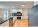 Well-equipped kitchen features stainless steel appliances, sleek countertops, and efficient layout for cooking at 17148 E Evans Dr, Aurora, CO 80013