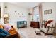 Stylishly decorated bedroom with crib, comfortable seating, and natural light at 7227 Clarke Dr, Frederick, CO 80530