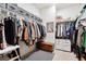 Walk-in closet with organized shelving and hanging space for clothes and accessories at 7227 Clarke Dr, Frederick, CO 80530