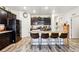 Well-equipped kitchen featuring a large island with seating and stainless steel appliances at 7227 Clarke Dr, Frederick, CO 80530