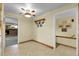 Dining area boasts an open floor plan with a ceiling fan and access to other rooms at 1091 E Pinewood Ave, Centennial, CO 80121