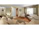A comfortable living room featuring a plush seating area and warm, inviting decor at 1091 E Pinewood Ave, Centennial, CO 80121