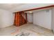 Unfinished basement with exposed beams and unique chalk drawings on the floor at 8602 N 39Th St, Longmont, CO 80503