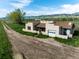 Charming single-story home featuring attached garage, mountain views and open fields at 8602 N 39Th St, Longmont, CO 80503