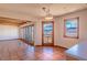 Open-concept living space with mountain views, Saltillo tile, and exposed wood beams at 8602 N 39Th St, Longmont, CO 80503