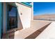 Private outdoor patio with a view. The sliding glass door and trim have beautiful turquoise accents at 8602 N 39Th St, Longmont, CO 80503