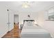Inviting bedroom featuring plush carpet, neutral paint, and natural light from a window at 2047 S Milwaukee St # 4, Denver, CO 80210