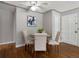 Dining room features modern decor, wood flooring, and updated light fixtures at 2047 S Milwaukee St # 4, Denver, CO 80210