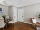 Dining room features hardwood floors, neutral walls, with a round table and four chairs at 2047 S Milwaukee St # 4, Denver, CO 80210