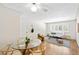 Inviting living and dining room with beautiful hardwood floors and bright natural light at 2047 S Milwaukee St # 4, Denver, CO 80210