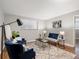 Comfortable living room boasting hardwood floors, window and contemporary furnishings at 2047 S Milwaukee St # 4, Denver, CO 80210