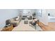 Bright living room with plush gray couches, light neutral walls, and hardwood floors for a warm ambiance at 2047 S Milwaukee St # 4, Denver, CO 80210