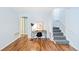 Bright office space features hardwood floors, a modern desk, and a staircase to the right at 2047 S Milwaukee St # 4, Denver, CO 80210