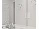 Bright bathroom featuring a chrome faucet, mirror, towel rings, and pristine white countertops at 8819 Sedalia St, Commerce City, CO 80022