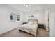 Bright bedroom with a double bed and window at 5232 Columbine Ln, Denver, CO 80221