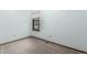 Small bedroom with neutral-colored walls, carpet, one window, and baseboard trim at 182 Lois Cir, Louisville, CO 80027