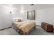 Bedroom with sconces, wood chest, carpet and window at 182 Lois Cir, Louisville, CO 80027